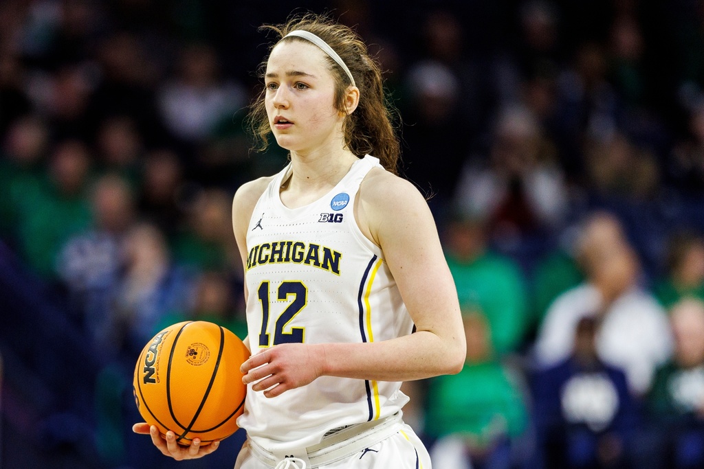 FILE - Michigan guard Syla Swords (12) controls the ball during the second half in the first round of the NCAA college basketball tournament against Iowa State, March 21, 2025, in South Bend, Ind. (AP Photo/John Mersits, File)