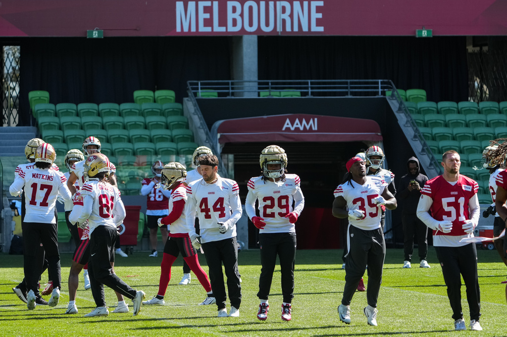 San Francisco 49ers players work out during a practice Wednesday, Sept. 9, 2026, in Melbourne, Australia, in preparation for an NFL football game against the Los Angeles Rams. (AP Photo/Asanka Brendon Ratnayake)