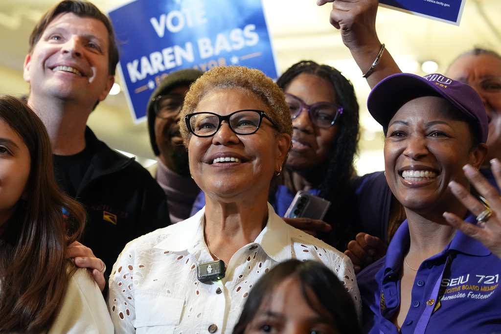 Los Angeles Mayor Karen Bass, center, poses for a group photo during a campaign event at SEIU 721 headquarters in Los Angeles on Saturday, May 30, 2026. (AP Photo/Scott Strazzante)