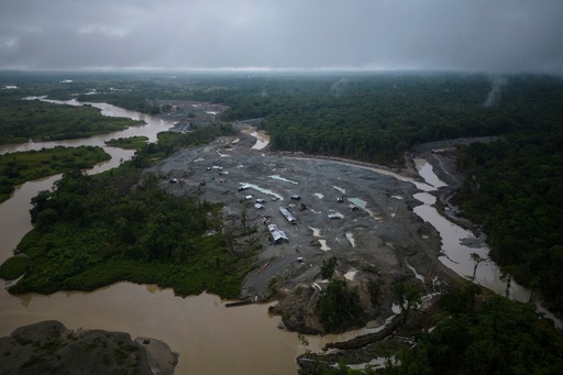 FILE - An illegal mining camp, sits along the Quito River, the Atrato River's main tributary, near Paimado, Colombia, Sept. 23, 2024. (AP Photo/Ivan Valencia, File) FILE - An illegal mining camp, sits along the Quito River, the Atrato River's main tributary, near Paimado, Colombia, Sept. 23, 2024. (AP Photo/Ivan Valencia, File)
