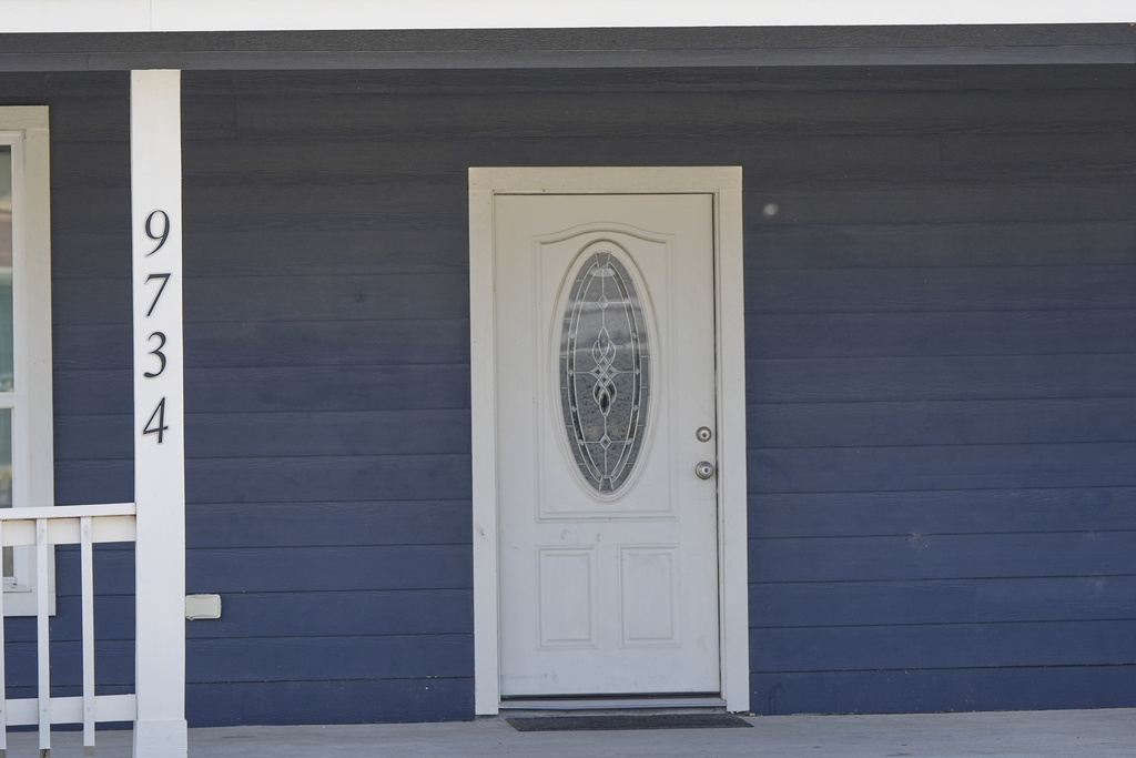 A home is shown Tuesday, Sept. 2, 2025, in Houston, near the location where 11-year-old Julian Guzman was shot and killed during a doorbell prank, according to police. (AP Photo/David J. Phillip)