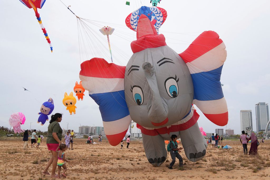 An elephant-shaped kite takes flight at the Colombo International Kite Festival in Colombo, Sri Lanka, Saturday, Aug. 23, 2025. (AP Photo/Eranga Jayawardena)
