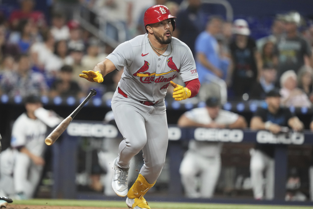 St. Louis Cardinals' Ivan Herrera runs after hitting a RBI single to score two runs during the second inning of a baseball game against the Miami Marlins, Tuesday, Aug. 19, 2025, in Miami. (AP Photo/Lynne Sladky)