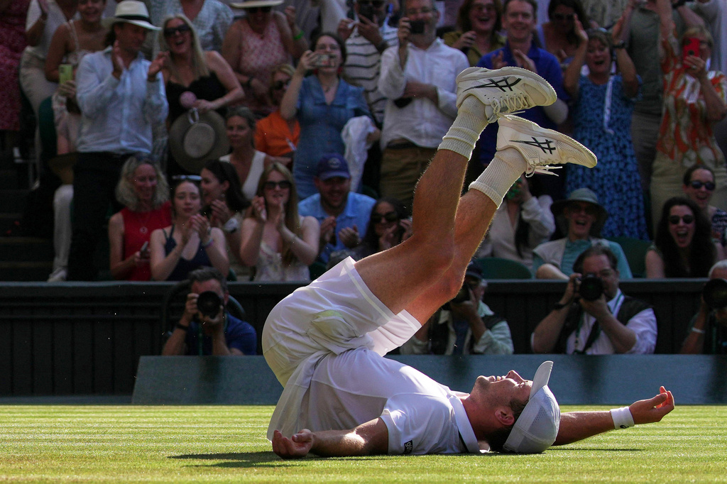 Arthur Fery of Britain reacts to winning against Flavio Cobolli of Italy in their quarter-final men's singles match at the Wimbledon Tennis Championships in London, Wednesday, July 8, 2026. (AP Photo/Brian Inganga)