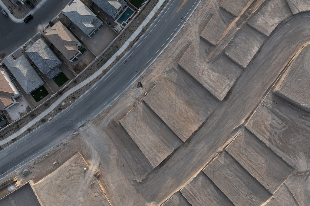 Home sites are seen under construction Monday, Feb. 2, 2026, in Las Vegas. (AP Photo/John Locher)