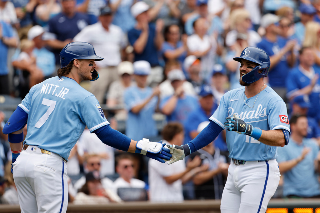 Kansas City Royals' Nick Loftin, right, celebrates after his three-run home run with Bobby Witt Jr. (7) during the second inning of a baseball game against the Detroit Tigers in Kansas City, Mo., Sunday, Aug. 23, 2026. (AP Photo/Colin E. Braley)