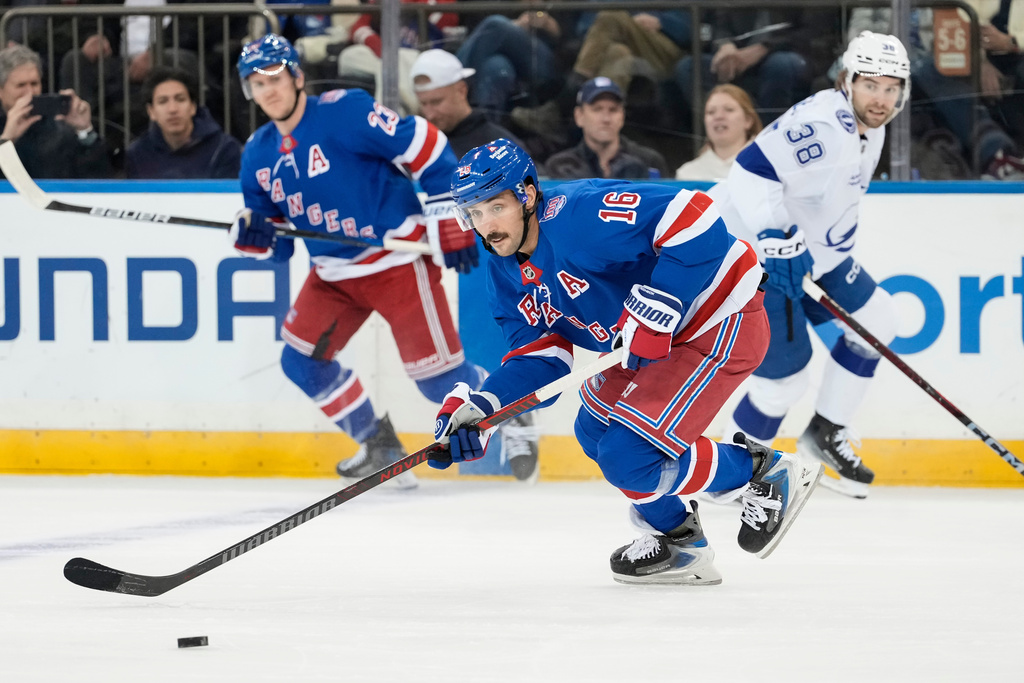 New York Rangers center Vincent Trocheck (16) looks to pass during the first period of an NHL hockey game against Tampa Bay Lightning, Saturday, Nov. 29, 2025, in New York. (AP Photo/Yuki Iwamura)
