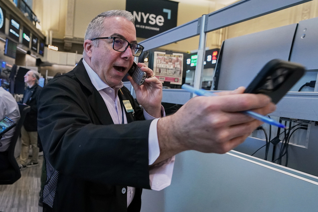 Options trader Joseph D'Arrigo works on the floor of the New York Stock Exchange, Tuesday, June 16, 2026. (AP Photo/Richard Drew)
