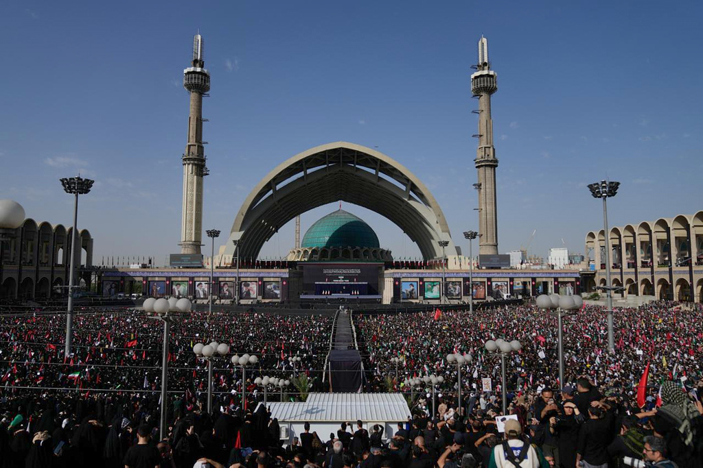 A crowd attends the start of the dayslong funeral ceremonies at the Imam Khomeini Mosalla Grand Mosque in Tehran, Iran, Saturday, July 4, 2026. (AP Photo/Altaf Qadri)
