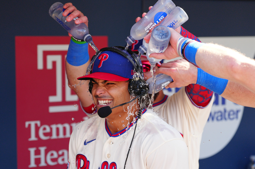 Philadelphia Phillies pitcher Jesús Luzardo is doused by teammates in the dugout after a baseball game against the Atlanta Braves, Monday, Sept. 7, 2026, in Philadelphia. (AP Photo/Derik Hamilton)