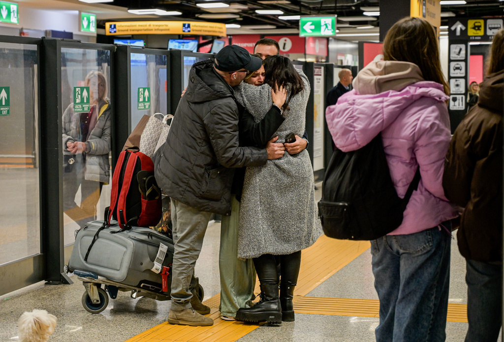The flight from Abu Dhabi with passengers returned to Italy arrives at Fiumicino Airport, in Rome, Tuesday, March 3, 2026. (Valentina Stefanelli/LaPresse via AP)