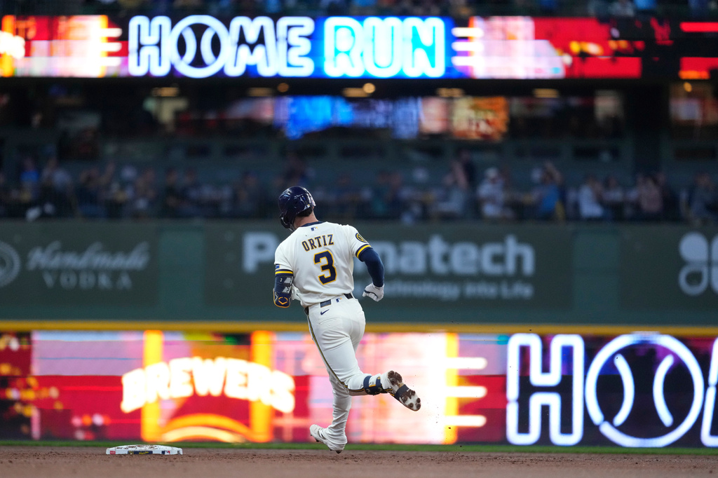 Milwaukee Brewers' Joey Ortiz rounds the bases after hitting a solo home run during the third inning of a baseball game against the San Diego Padres, Tuesday, May 12, 2026, in Milwaukee. (AP Photo/Aaron Gash)