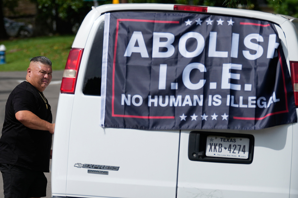 Mark Rodriguez exits his van outside a visitation for Lorenzo Salgado Araujo, who was shot and killed by an ICE officer last week, Thursday, July 16, 2026, in Houston. (AP Photo/David J. Phillip)