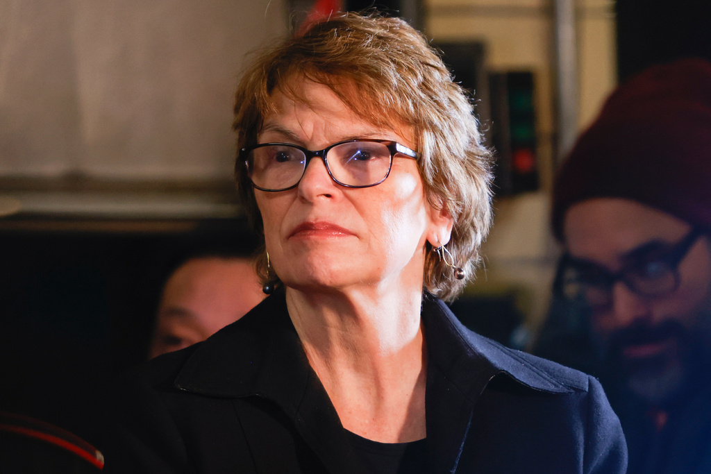 Brown University President Christina H. Paxson attends a news conference addressing the investigation following a shooting on Brown University's campus Saturday, Dec. 13, 2025, in Providence, R.I. (Lily Speredelozzi/The Sun Chronicle via AP)