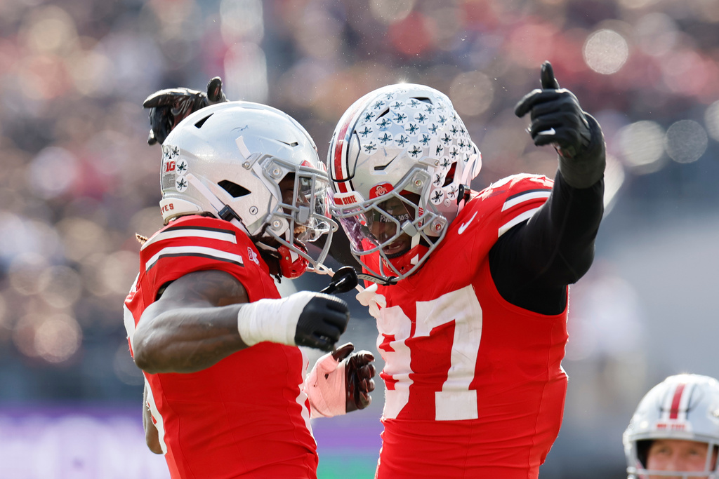 Ohio State linebacker Arvell Reese, left, celebrates his sack against Penn State with teammate defensive lineman Kenyatta Jackson during the second half of an NCAA college football game, Saturday, Nov. 1, 2025, in Columbus, Ohio. (AP Photo/Jay LaPrete)