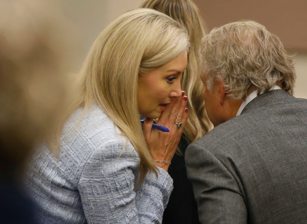 Abby Zwerner's attorney Diane Toscano confers with her colleague Jeffrey Breit during Zwerner's lawsuit Tuesday, Oct. 28, 2025, in Newport News, Va. (Stephen M. Katz/The Virginian-Pilot via AP, Pool)