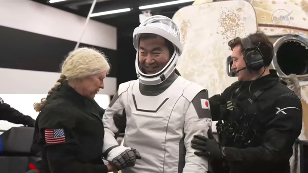 This screengrab from video provided by NASA shows NASA Japanese astronaut Kimiya Yui being helped out of the SpaceX Crew-11 capsule after they re-entered the earth in a middle-of-the-night splashdown near San Diego, Calif., Thursday, Jan. 15, 2026. (NASA via AP)