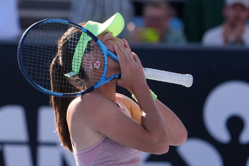 Zeynep Sonmez of Turkey reacts after defeating Ekaterina Alexandrova of Russia in their first round match at the Australian Open tennis championship in Melbourne, Australia, Sunday, Jan. 18, 2026. (AP Photo/Asanka Brendon Ratnayake)