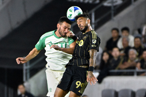 Austin FC defender Brendan Hines-Ike, left, vies for a header with LAFC forward Denis Bouanga during the first half of Game 1 in the first round of MLS soccer's Western Conference playoff Wednesday, Oct. 29, 2025, in Los Angeles. (AP Photo/Wally Skalij) Austin FC defender Brendan Hines-Ike, left, vies for a header with LAFC forward Denis Bouanga during the first half of Game 1 in the first round of MLS soccer's Western Conference playoff Wednesday, Oct. 29, 2025, in Los Angeles. (AP Photo/Wally Skalij)