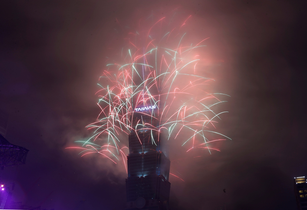 Fireworks explode from the Taipei 101 building during the New Year's celebrations in Taipei, Taiwan, Thursday, Jan. 1, 2026. (AP Photo/Chiang Ying-ying)