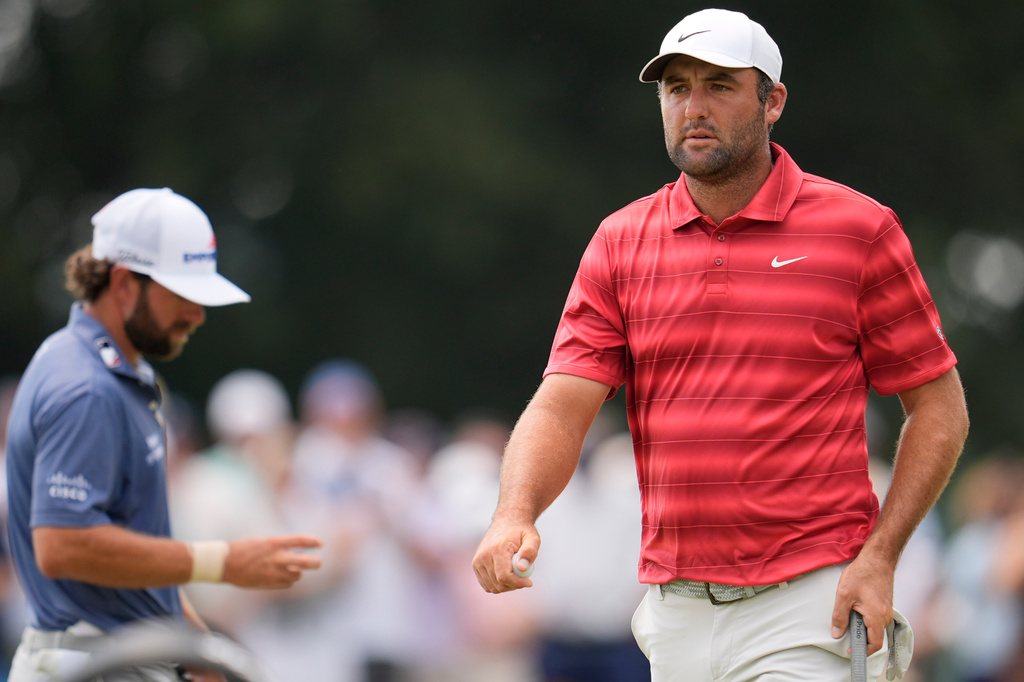 Scottie Scheffler walks on the first green during the third round of the PGA Tour Championship golf tournament, Saturday, Aug 29, 2026, in Atlanta.(AP Photo/Mike Stewart)