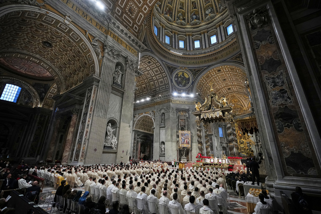 Pope Leo XIV celebrates Mass on the Day of the Epiphany of the Lord inside St. Peter's Basilica at the Vatican, Tuesday, Jan. 6, 2026. (AP Photo/Alessandra Tarantino)
