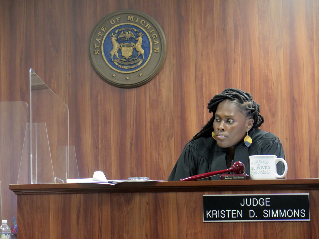 FILE - Ingham County District Court Judge Kristen Simmons oversees a preliminary examination in Lansing, Mich., on Wednesday, Dec. 13, 2023, for six of the 15 Michigan Republicans who face forgery and other charges for serving as false electors for then-President Donald Trump in 2020. (AP Photo/Joey Cappelletti, File)