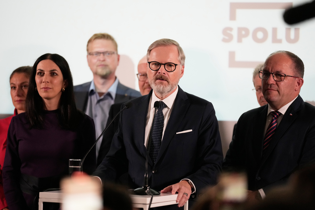 Czech Republic's Prime Minister and leader of coalition of three conservative parties called "Together" Petr Fiala addresses the media during the parliamentary elections in Prague, Czech Republic, Saturday, Oct. 4, 2025. (AP Photo/Darko Bandic)