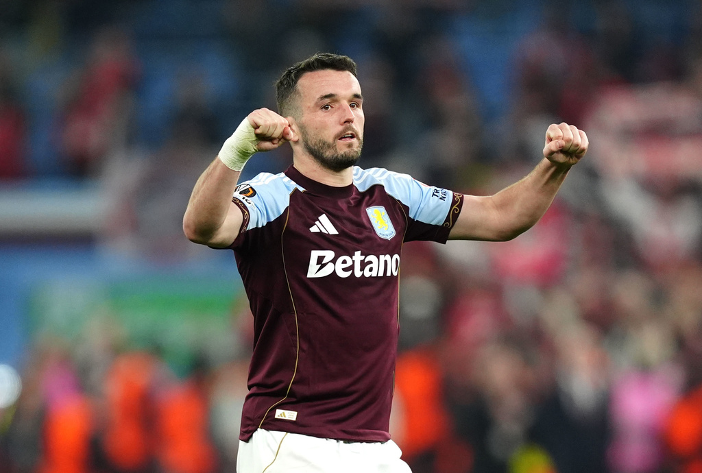 Aston Villa's John McGinn celebrates the win after the Europa League round of sixteen second leg soccer match between Aston Villa and LOSC Lille in Birmingham, England, Thursday, March 19, 2026. (David Davies/PA via AP)