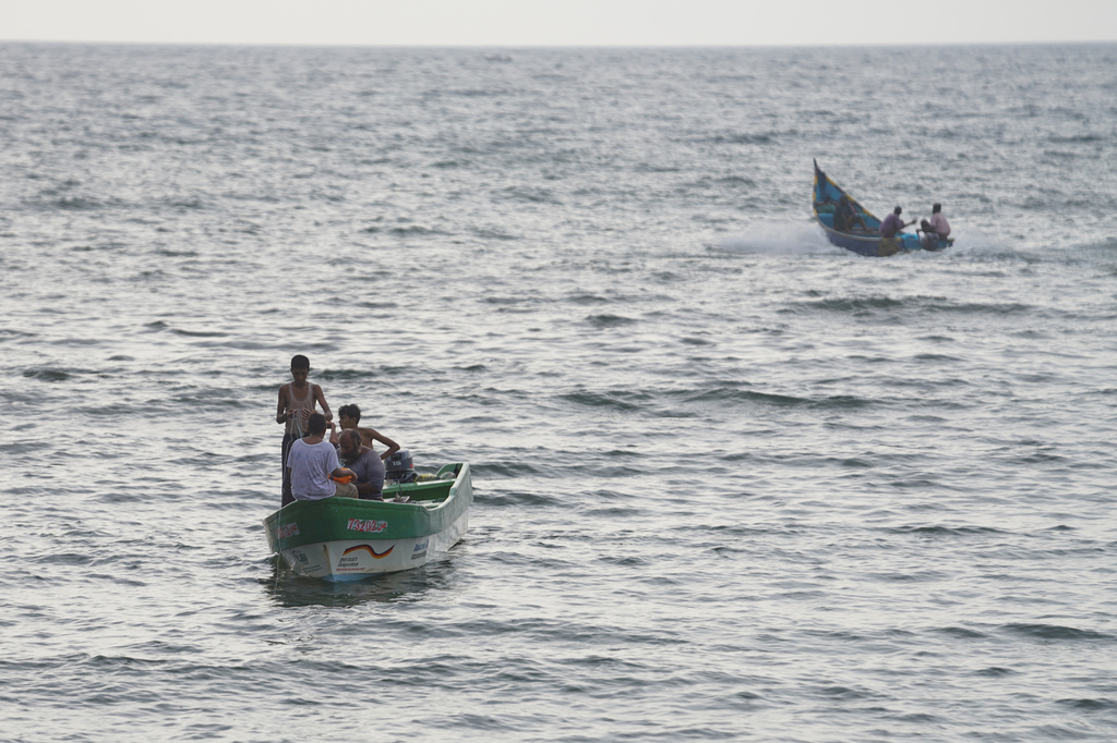 Fishermen wait to catch fish near Sirah fish market in Aden, Yemen, Tuesday, Sept. 15, 2026. (AP Photo/Abdulnasser Alseddik)