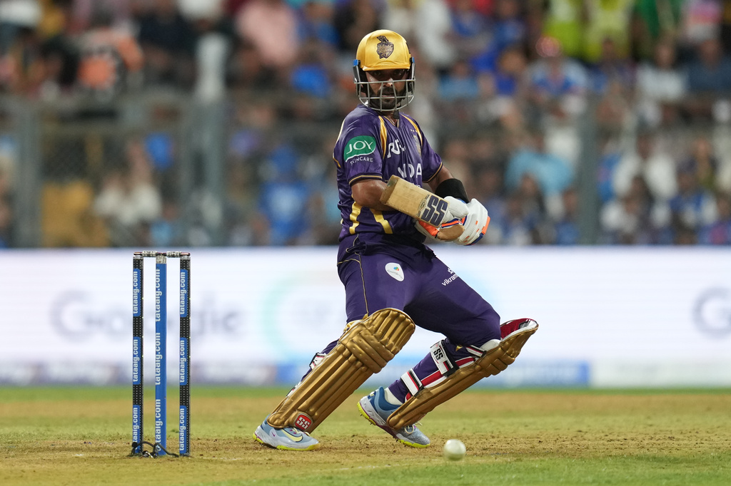 Kolkata Knight Riders' captain Ajinkya Rahane plays a shot during the Indian Premier League cricket match between Mumbai Indians and Kolkata Knight Riders in Mumbai, India, Sunday, March 29, 2026. (AP Photo/Rafiq Maqbool)