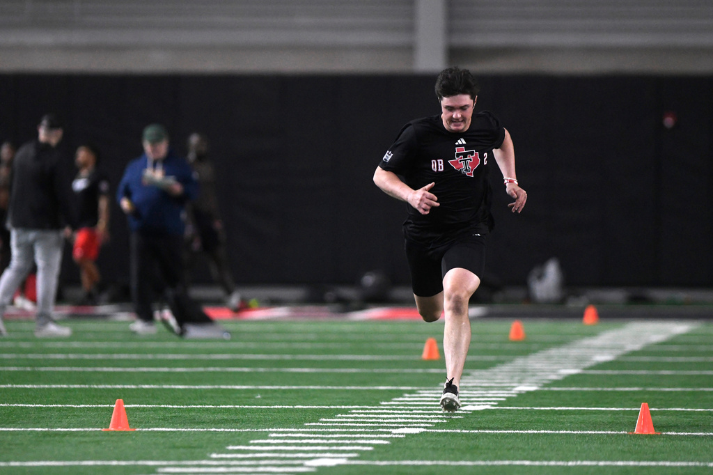 Texas Tech quarterback Behren Morton runs the 40-yard dash during the school's NFL football pro day, Thursday, March 26, 2025, in Lubbock, Texas. (AP Photo/Annie Rice)