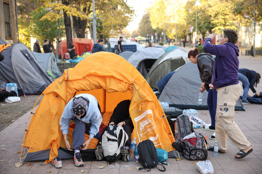 Students pack and prepare to continue marching to Novi Sad for a huge rally on Nov. 1 marking the first anniversary of a train station disaster that killed 16 people, in Indjija, Serbia, Friday, Oct. 31, 2025. (AP Photo/Armin Durgut) Students pack and prepare to continue marching to Novi Sad for a huge rally on Nov. 1 marking the first anniversary of a train station disaster that killed 16 people, in Indjija, Serbia, Friday, Oct. 31, 2025. (AP Photo/Armin Durgut)