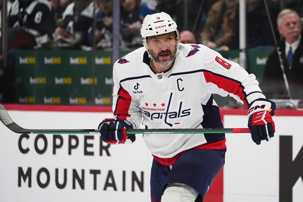 Washington Capitals left wing Alex Ovechkin pursues the puck in the second period of an NHL hockey game against the Colorado Avalanche, Monday, Jan. 19, 2026, in Denver. (AP Photo/David Zalubowski)