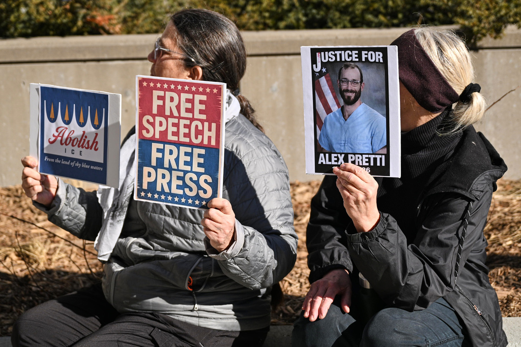 People gather outside the U.S. District Courthouse in St. Paul, Minn., in support of journalist Don Lemon and Nekima Levy Armstrong ahead of their hearing Friday, Feb. 13, 2026. (AP Photo/Tom Baker)