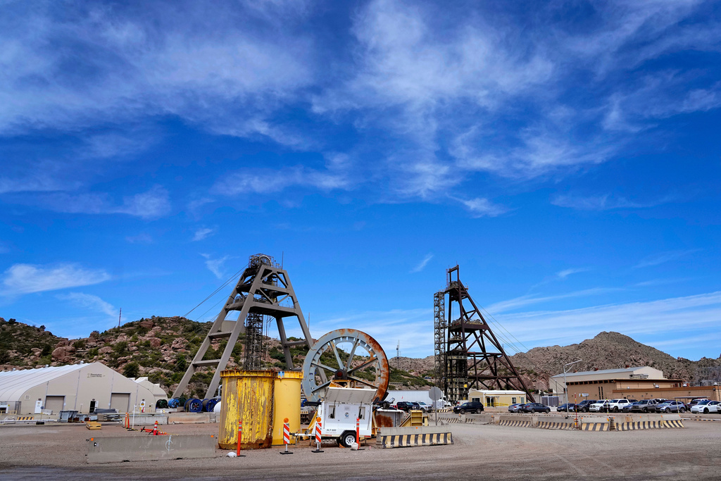 FILE - Mine shafts 10, left, and 9, right, tower over the Resolution Copper Mining Company facility, June 9, 2023, in Miami, Ariz. (AP Photo/Matt York, File)