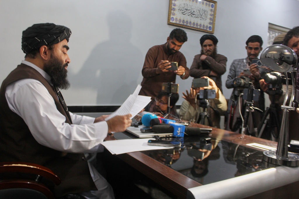 Afghan government spokesperson Zabihullah Mujahid reads a statement to journalists in Kandahar, Afghanistan, Friday, Feb. 27, 2026. (AP Photo/Sibghatullah)