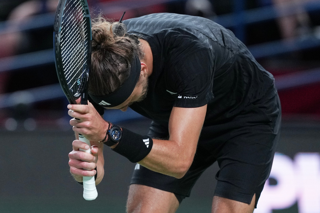 Alexander Zverev of Germany reacts after losing a point to Arthur Rinderknech of France during the men's singles match of the Shanghai Masters tennis tournament at Qizhong Forest Sports City Tennis Center, in Shanghai, China, Monday, October. 6, 2025. (AP Photo/Andy Wong)