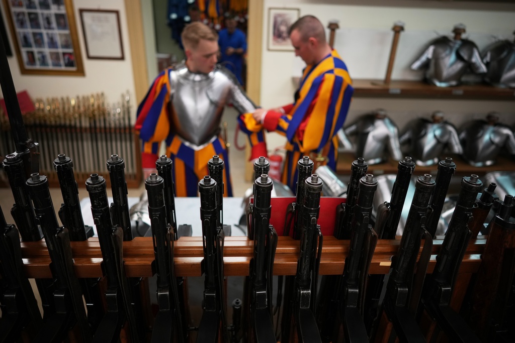Pontifical Swiss Guards prepare ahead of their swearing in ceremony, at the Vatican, Saturday, Oct. 4, 2025. (AP Photo/Andrew Medichini)