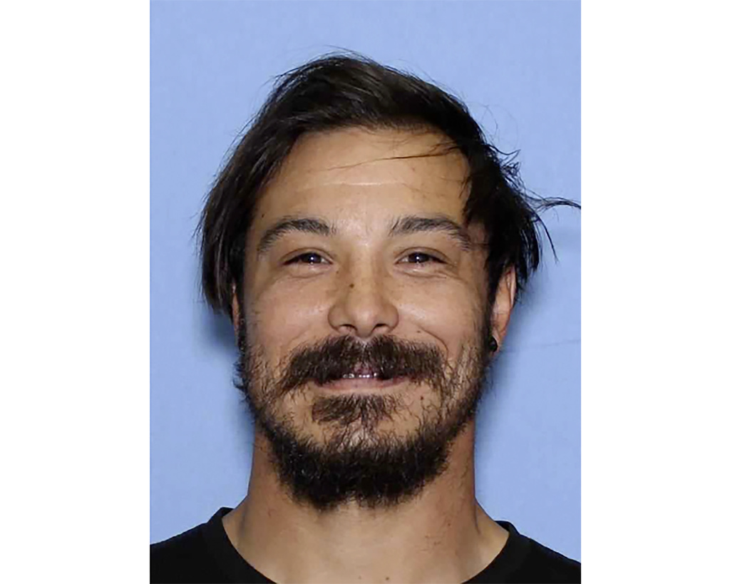 FILE - This undated photo provided by the Wenatchee Police Department shows Travis Caleb Decker, who is wanted in connection with the deaths of his three daughters. (Wenatchee Police Department via AP, File)