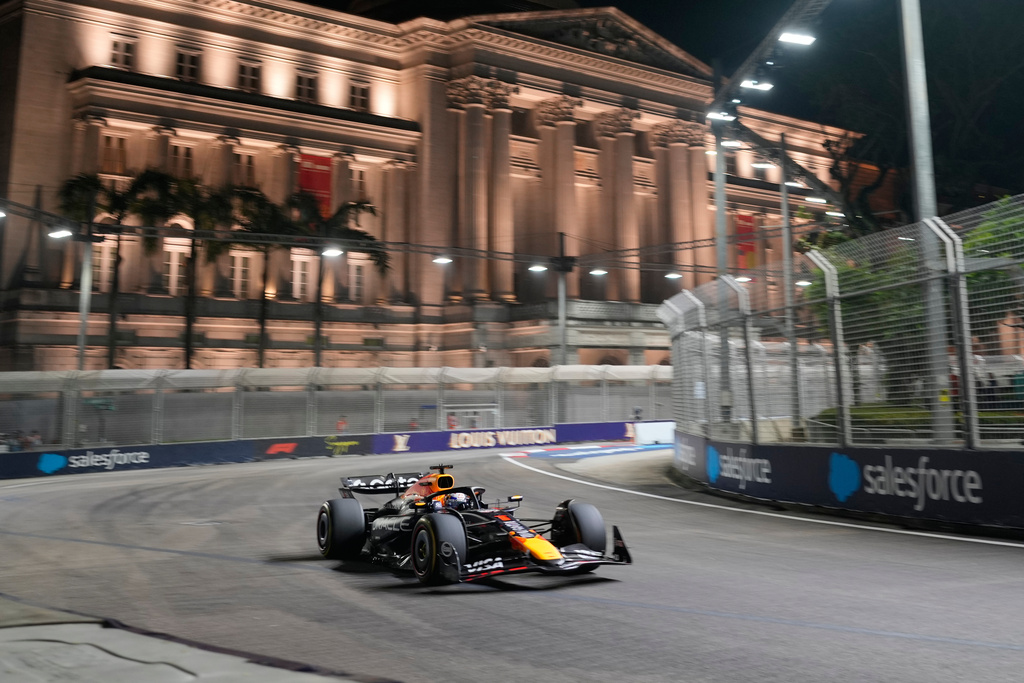 Red Bull driver Max Verstappen of the Netherlands steers his car during the second practice session of the Singapore Formula One Grand Prix at the Marina Bay Street Circuit in Singapore, Friday, Oct. 3, 2025. (AP Photo/Vincent Thian)