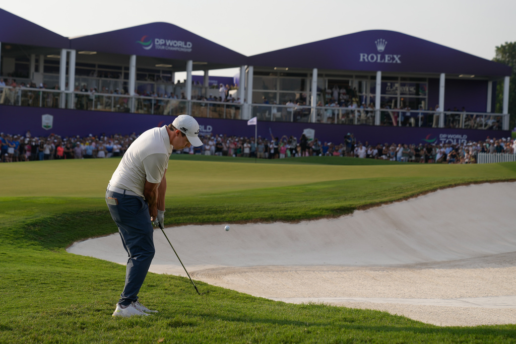 Matt Fitzpatrick of England putts on the 18th green during the final round of World Tour Golf Championship in Dubai, United Arab Emirates, Sunday, Nov. 16, 2025. (AP Photo/Altaf Qadri)
