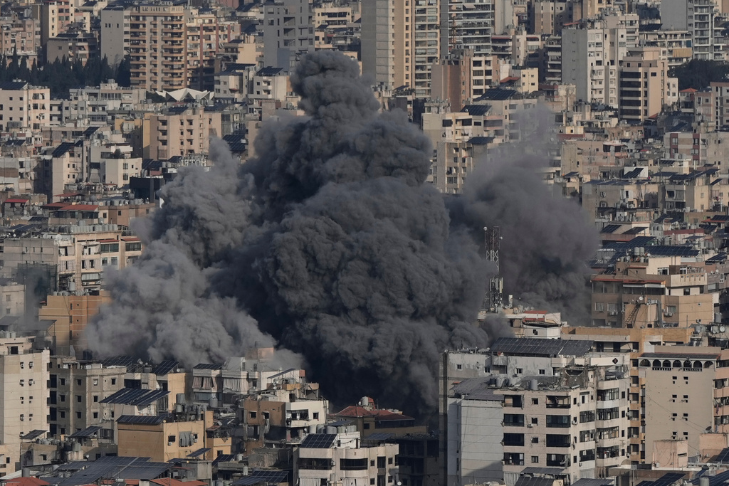 Smoke rises following an Israeli airstrike in Dahiyeh, southern suburb of Beirut, Lebanon, Wednesday, March 4, 2026. (AP Photo/Bilal Hussein)