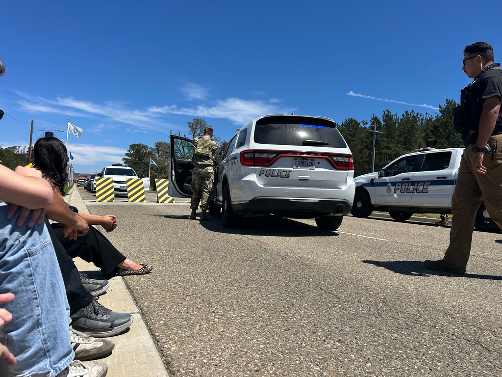 Journalists wait after being stopped by security officers at Vandenberg Space Force Base in California on Monday, Aug. 17, 2026. (Jarrod Zinn/KEYT via AP)