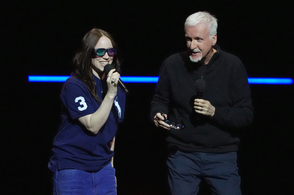 FILE - Billie Eilish, left, and director James Cameron speak about their upcoming film "Billie Eilish: Hit Me Hard and Soft - The Tour Live in 3D" during the Paramount Pictures presentation at CinemaCon in Las Vegas on April 16, 2026. (AP Photo/Chris Pizzello, File)