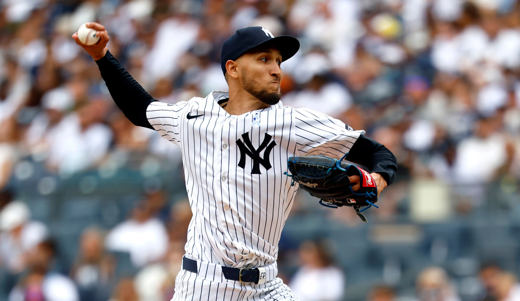 New York Yankees pitcher Elmer Rodriguez throws against the Cincinnati Reds during the first inning of a baseball game, Sunday, June 21, 2026, in New York. (AP Photo/Noah K. Murray)