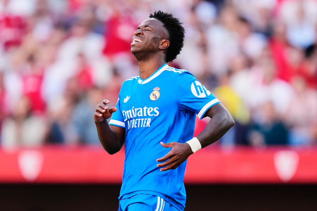 Real Madrid's Vinicius Junior reacts during the Spanish La Liga soccer match between Real Madrid and Sevilla at the Ramon Sanchez Pizjuan stadium in Seville, Spain, Sunday, May 17, 2026. (AP Photo/Jose Breton)