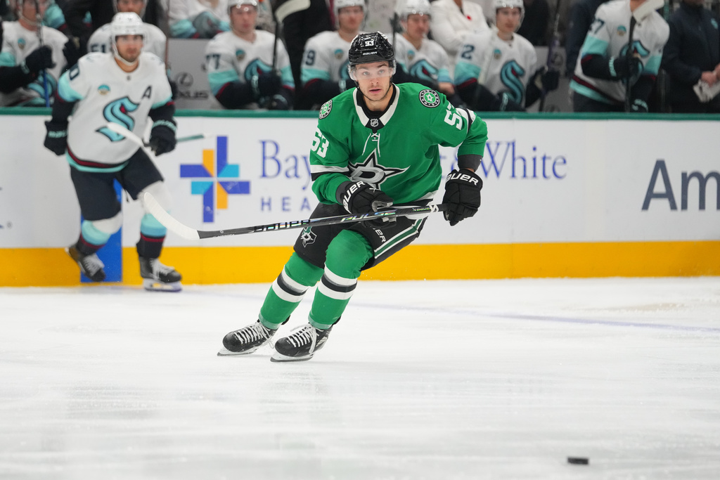 Dallas Stars center Wyatt Johnston skates against the Seattle Kraken during the first period of an NHL hockey game Sunday, Nov. 9, 2025, in Dallas. (AP Photo/Julio Cortez)