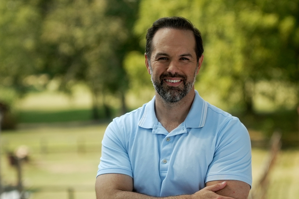 In this photo released by Joel Willett, U.S. Senate candidate Joel Willett poses for a photo on Sept. 11, 2025, in Valley Station, a suburb of Louisville, Ky. (Joe Willett via AP)