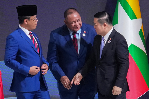 Indonesia's Foreign Minister Sugiono, left, and East Timor's Foreign Minister Bendito dos Santos Freitas, center, speak with ASEAN Secretary-General Kao Kim Hourn during the ASEAN foreign ministers/ meeting in Kuala Lumpur, Malaysia, Saturday, Oct. 25, 2025. (AP Photo/Rafiq Maqbool) Indonesia's Foreign Minister Sugiono, left, and East Timor's Foreign Minister Bendito dos Santos Freitas, center, speak with ASEAN Secretary-General Kao Kim Hourn during the ASEAN foreign ministers/ meeting in Kuala Lumpur, Malaysia, Saturday, Oct. 25, 2025. (AP Photo/Rafiq Maqbool)